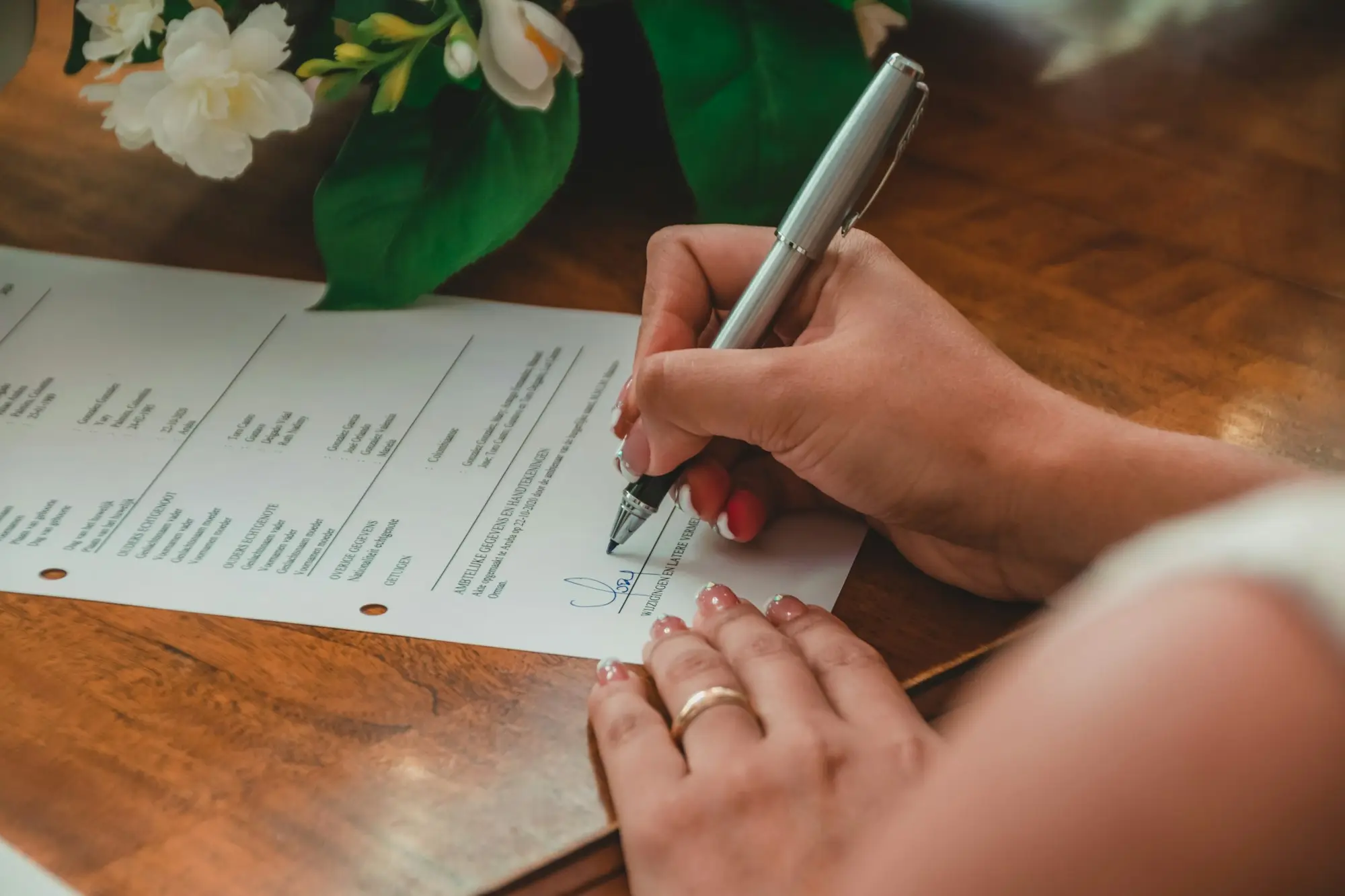 Signing a document with a pen