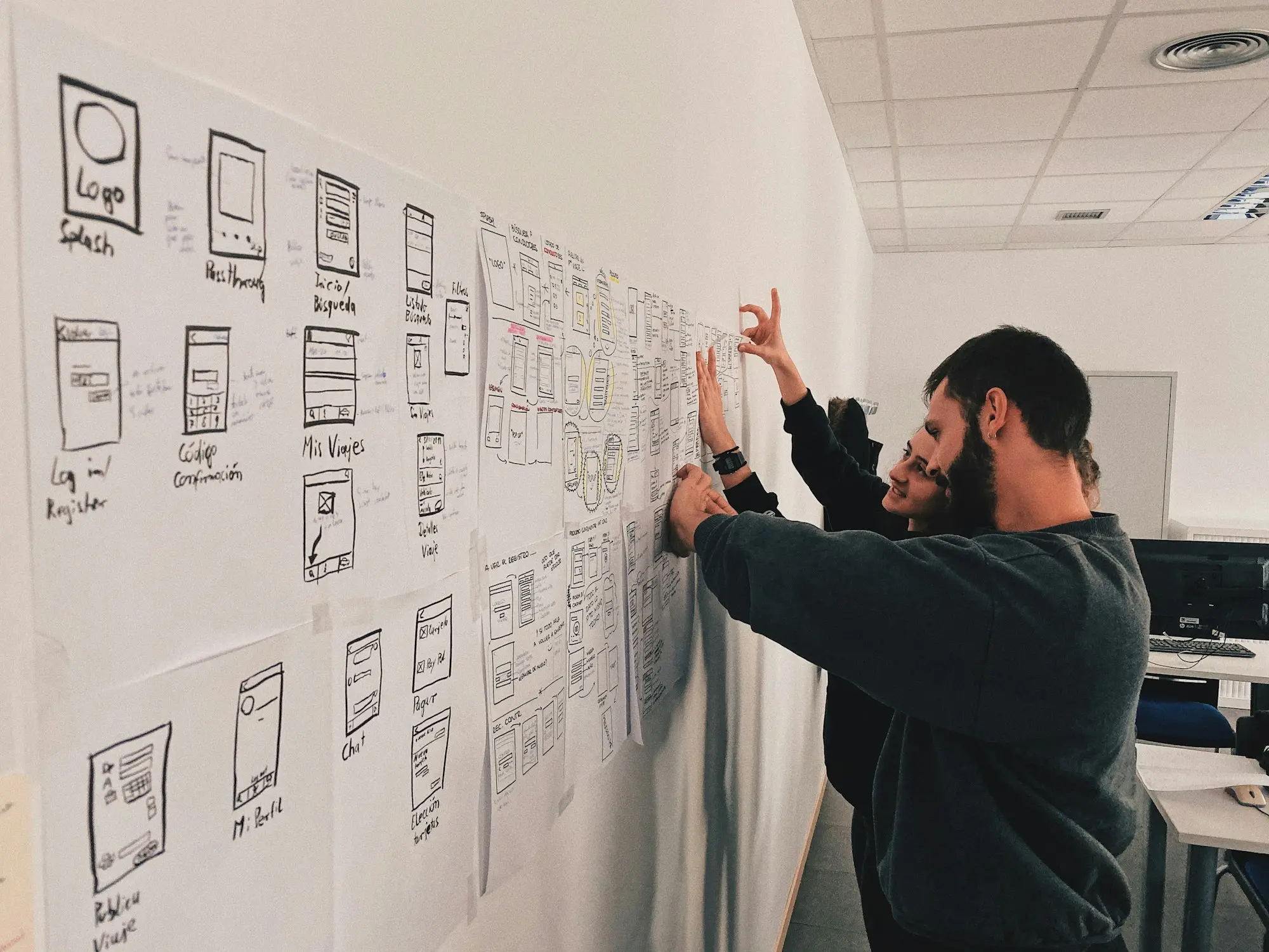 Man mapping out a plan on a whiteboard