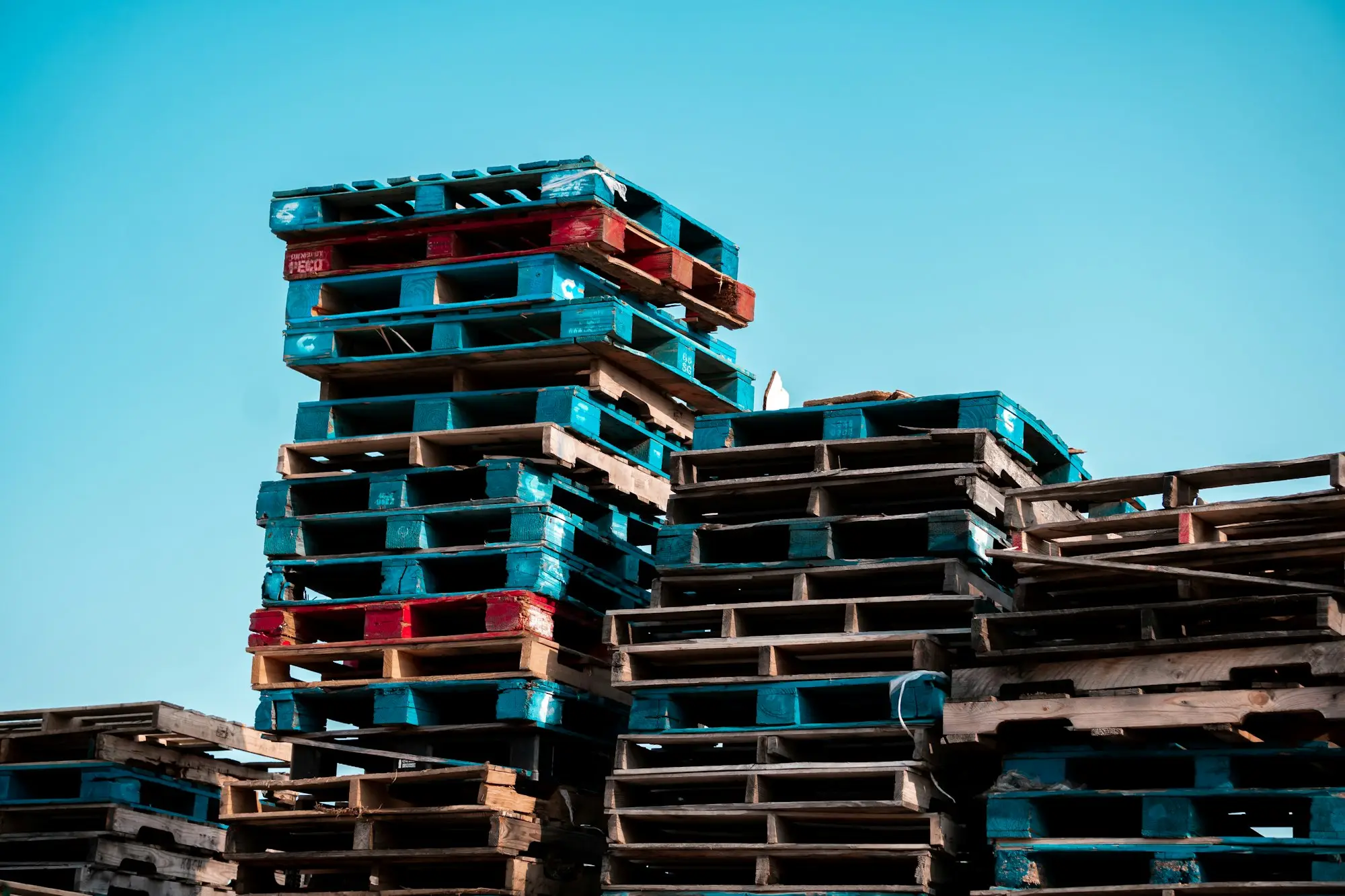 Stacks of pallets in a yard